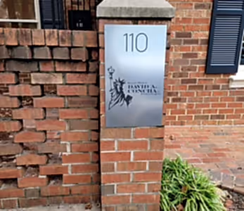 business address metal sign in charlotte