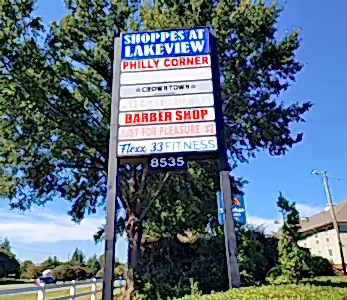 post and panel monument tenant signage for plaza charlotte