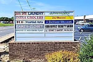 monument tenant shopping plaza sign