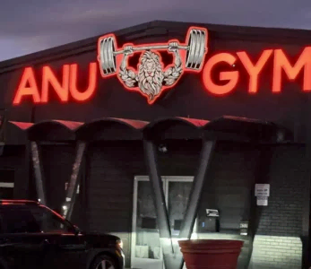 Anu Gym at Night Storefront signage in charlotte